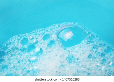 Background Soap Suds (foam) And Bubbles From Detergent. House Cleaning Concept.