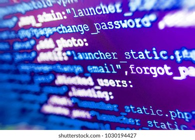 Background of software developer script. PHP data source file. Closeup of Java Script, CSS and HTML code. Hacker api text on the computer screen. Developing programming and coding technologies. 