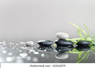 background of a spa with stones, and green leaves - Shutterstock ID 152510579