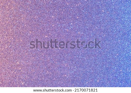 Background with sparkles. Backdrop with glitter. Shiny textured surface. Slightly desaturated blue. Mixed neon light