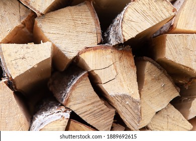 Background From Stack Of Firewood From Birch Tree, For Heating House, Stacked In Backyard, Uncut Wood, Birch. Concept Eco-friendly Home Heating During Cold Season. Soft Selective Focus. Horizontal.