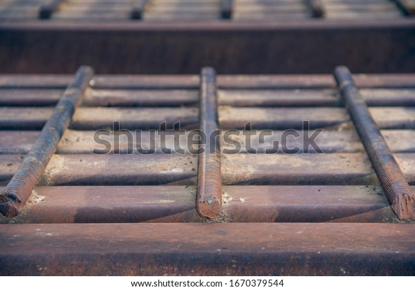Background of steel beams and\
rods