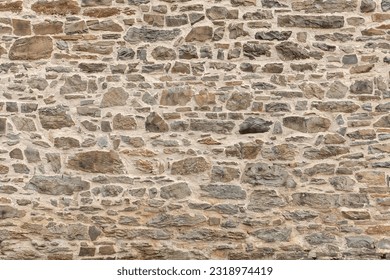 Background of stone wall texture. Close up of stone wall texture.