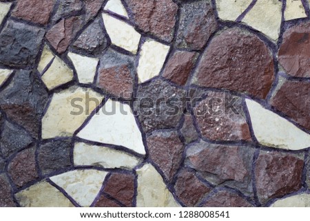 Background of stone wall texture. dark brown brick