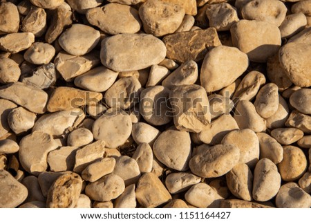 Background stones of round shape smooth sea