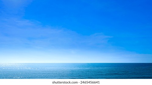 Background for summer vacation concept. Nature of the beach and sea, summer with sunlight, sandy beach The sparkling sea water contrasts with the blue sky  - Powered by Shutterstock