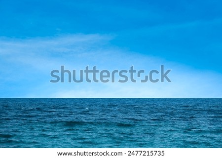 Similar – woman in red swimsuit walks by the sea. blurred