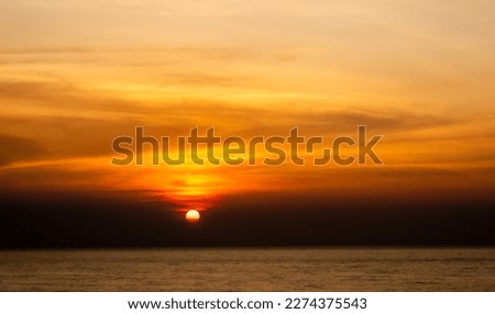 Background of sunset sky concept : sun in sunrise on sea, Morning time