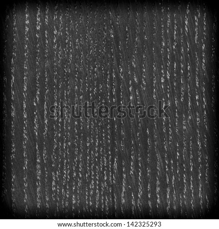 Background texture of black and white wood closeup with vignette