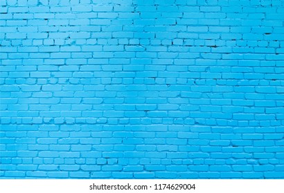Background and texture of brick wall painted blue.Horizontal close-up.
