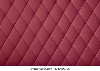 Background Texture Of Burgundy Purple Soft Tufted Furniture Or Wall Panel Upholstery With Deep Diamond Pattern, Close Up