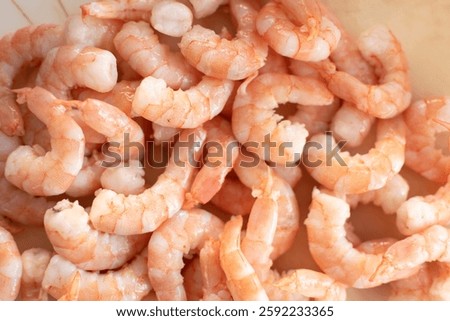 Background and texture of cooked headless Mexican shrimp ready for cooking