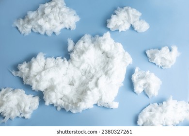 background texture of cotton wool clouds on a blue background for a newborn photo shoot