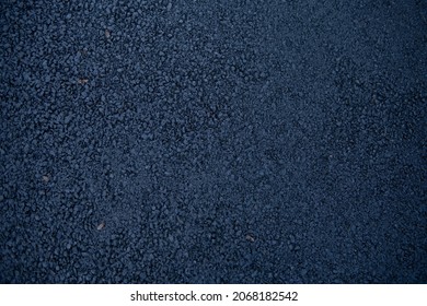 Background or Texture of Freshly Laid Black Tarmac or Asphalt on a Private Driveway in Rural Devon, England, UK - Shutterstock ID 2068182542