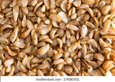 Background Texture Of Healthy, Savory Marinated Roasted Garlic Cloves For Use In Salads And As A Cooking Ingredient, Full Frame Overhead View