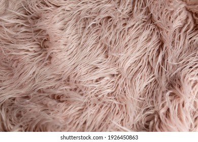 background texture. llama fur. artificial fur. pink fur