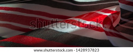 Background texture. multicolored striped silk fabric. Mexican coloring theme bright colored striped pattern with abstract stripes