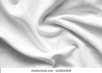 Background Texture Of New White Fleece Sheet, Soft Napped Insulating Fabric Made Of Polyester, Wavy Pattern, Top View