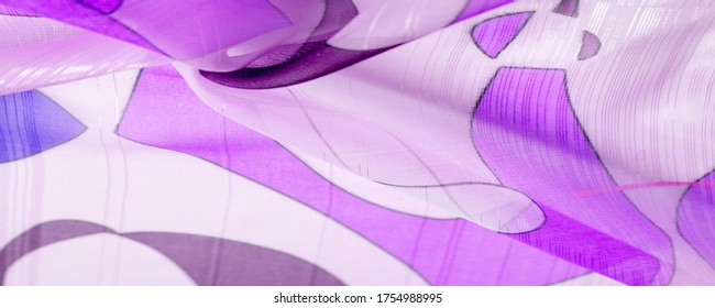 The background texture is an organza pattern - a light transparent fabric of fine knitwear, similar to a veil of fine viscose silk. white red blue geometric colors