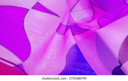 The background texture is an organza pattern - a light transparent fabric of fine knitwear, similar to a veil of fine viscose silk. white red blue geometric colors