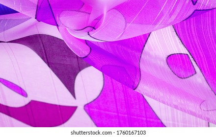 The background texture is an organza pattern - a light transparent fabric of fine knitwear, similar to a veil of fine viscose silk. white red blue geometric colors