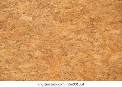background and texture of OSB or MDF board - particleboard wooden wet surface. - Shutterstock ID 556331884