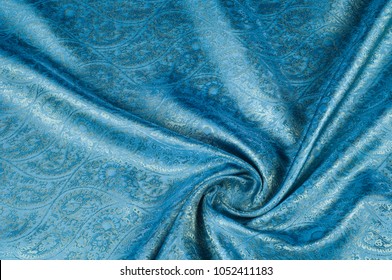 Background texture, pattern. Blue paisley silk chiffon mod fabric by the yard. Crinkled, flowy, soft, very light, 
