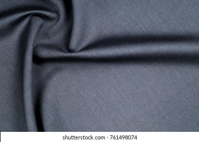Background texture, pattern. cloth wool suit gray. A genuine flannel is always made of carded yarn, carded flannel is ideal in the cold months of the year, it is heavy, cozy and soft.