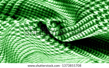Background texture pattern. The fabric is thick, warm with a checkered pattern green This soft double damping with a light weight is ideal for design and more! Features yarn dyed checkered dark green