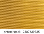 Background texture and pattern of section voshchina of wax honeycomb from a bee hive for filled with honey. Voshchina an artificial basis for the construction of honeycombs, sheet of wax of the cells
