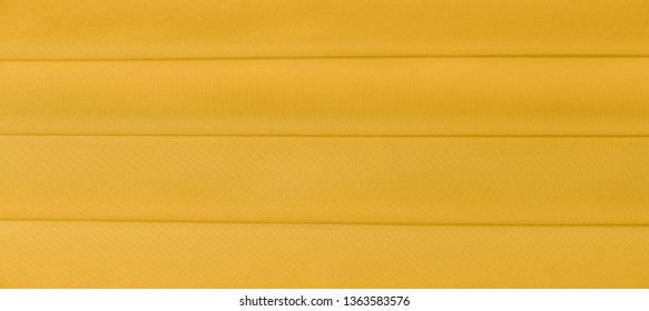 background texture, pattern. Yellow silk fabric. A very light faux dupioni silk fabric with rich drape and slub texture with a subtle matte sheen. It is perfect for your design accents. - Powered by Shutterstock