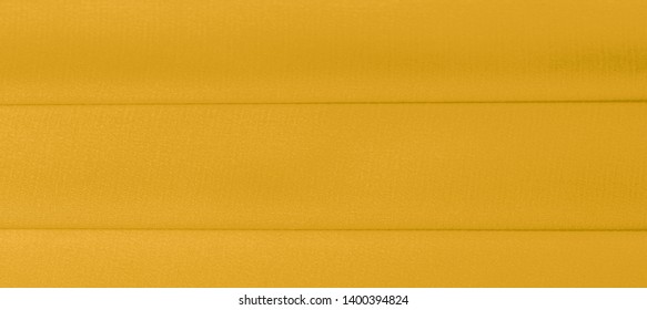 background texture, pattern. Yellow silk fabric. A very light faux dupioni silk fabric with rich drape and slub texture with a subtle matte sheen. It is perfect for your design accents. - Powered by Shutterstock