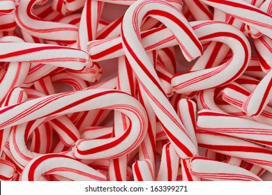 Background Texture Of Peppermint Candy Canes.