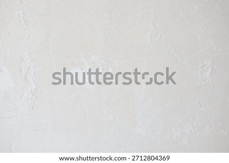 background texture of a raw, irregular, rustic, white cement wal