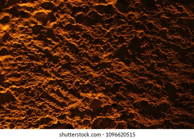 Background texture of rough red wall.