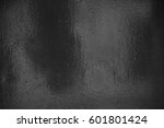 Background texture of shiny black grey foil
