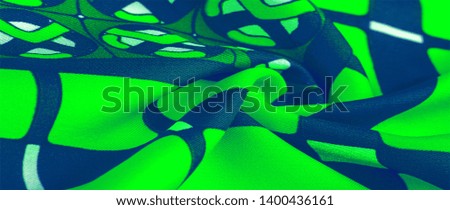 Background texture. silk bright fabric Mosaic geometric shapes Composition with colorful stained glass Grid design of green blue white olive colors
