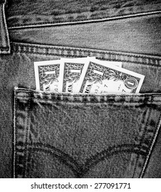 Background and texture of small money,currency,dollar in jeans pocket with black and white color