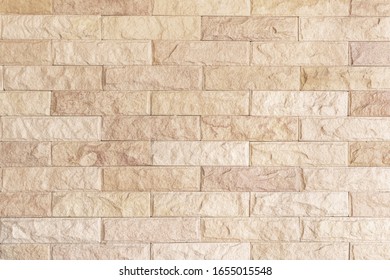 Background and texture stone cladding wall.