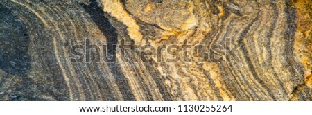 Background texture. template. A rock. any mass or aggregate of one or several mineral species or organic matter that are products of natural processes