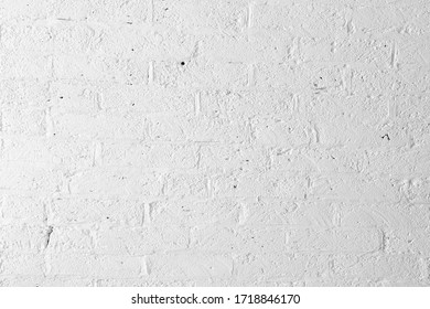 Background texture of a wall made of white thin bricks
