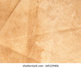 Background of textured paper with spots and folds - Shutterstock ID 645129406
