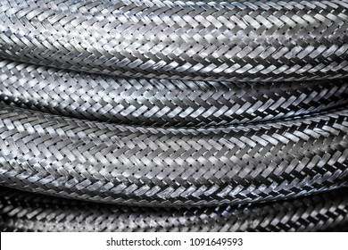 Background / Textures of Metal wire braided stainless flexible hose 