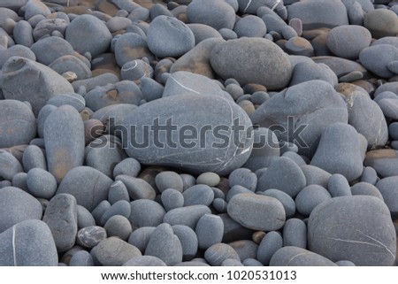 Background or Textures of Pebbles on the Beach at Westwood Ho on the North Devon Coast, England, UK