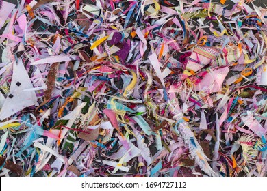 Background, Thread Remnants And Many Colorful Pieces, Which Come From Sewing, Repair, Pile Together.