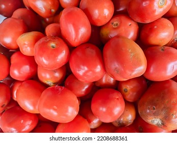 Background Of Tomato Vegetable Fruit At A Fruit Vendor