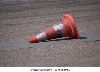 Background with traffic cone on road track