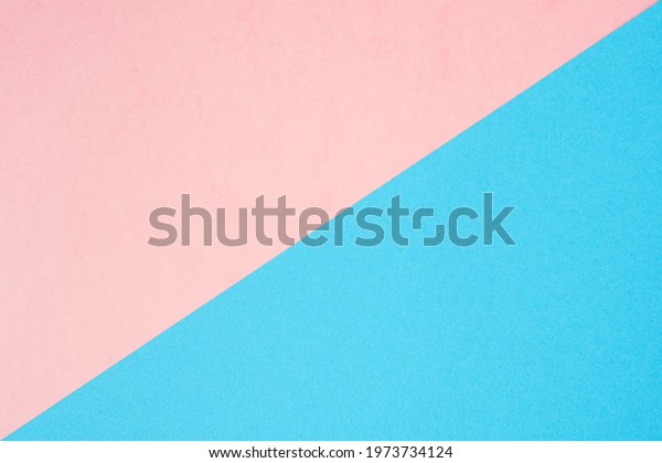 Background of two colors. Blue and pink paper
sheets divided
diagonally.