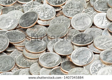 A Background of United States Dime Coins Close up