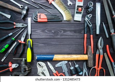 Background From Various Tools On Wooden Workbench. Top View.copy Space